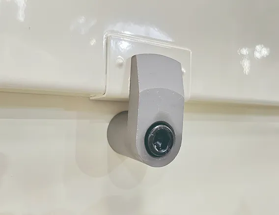 圧縮バネ付き押え金具